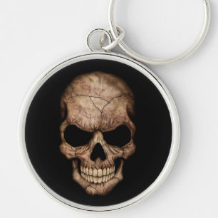 Cracked Skull Emerging From Darkness Keychain