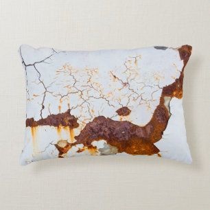 Cracked white paint, rusty car. accent pillow