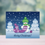 Crafty Snowman Knitting Scarf Acrylic Sign<br><div class="desc">Vector illustration of two adorable cartoon snowmen dressed in knitted hats and scarves. The big crafty snowman is knitting an oversized scarf for the little one. The scarf is already wrapped several times around the cute little snowman.</div>