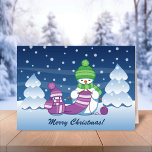 Crafty Snowman Knitting Scarf Holiday Card<br><div class="desc">Vector illustration of two adorable cartoon snowmen dressed in knitted hats and scarves. The big crafty snowman is knitting an oversized scarf for the little one. The scarf is already wrapped several times around the cute little snowman.</div>