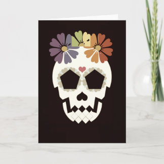 Crâne avec la carte de voeux de sépia de fleurs