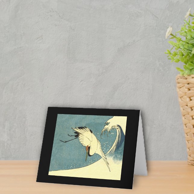 Crane Flying in a Wave Note Card (Flying stork type bird over big ocean wave with black border on notecards.)