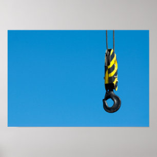 Crane hook with yellow and black stripes hanging poster