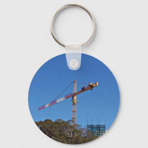 Crane in construction keychain