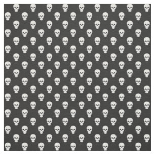 Crânes blancs sur tissu noir