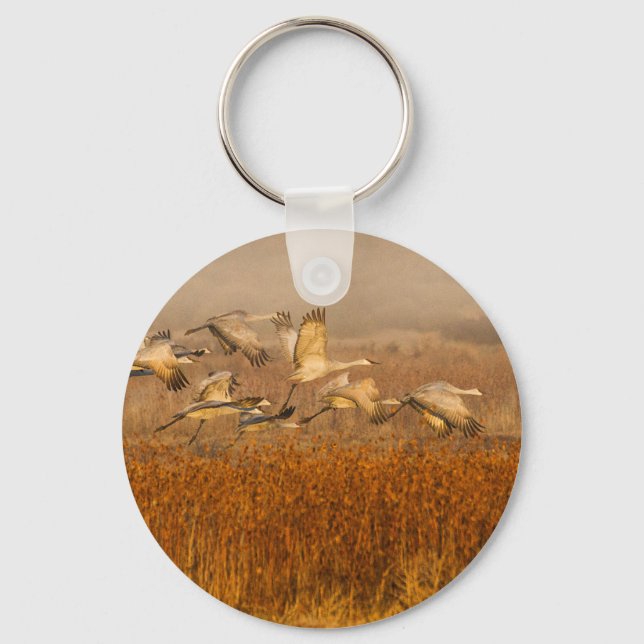 Cranes over a golden field keychain (Front)
