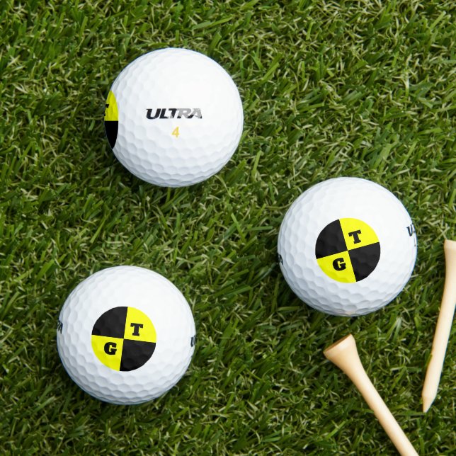 Crash test dummy black and yellow custom monogram golf balls (Insitu Grass)