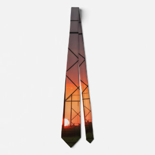 Cravate de silhouette du coucher de soleil des lig