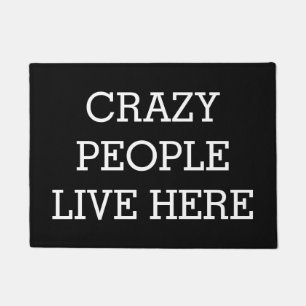 Crazy People Live Here Black Funny Doormat