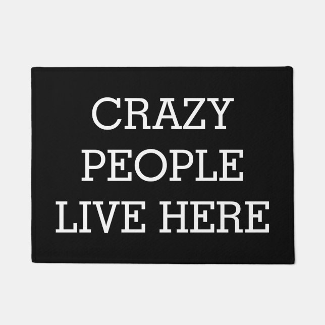 Crazy People Live Here Black Funny Doormat (Front)