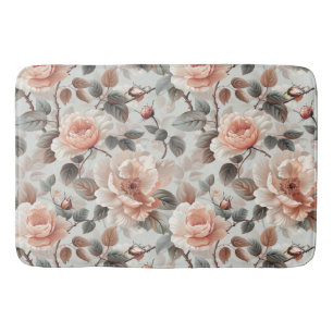 Cream flowers with grey leaves on a light grey bath mat