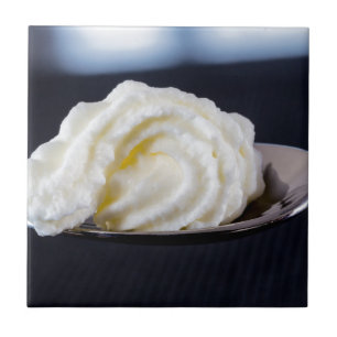 cream on a spoon macro concept tile