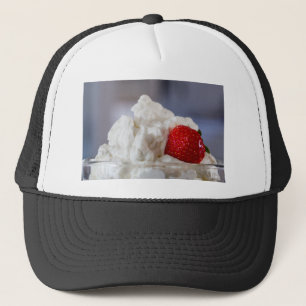 Cream with strawberries in a glass bowl trucker hat