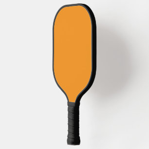 Create Stunning Visuals with Orange Background Pickleball Paddle