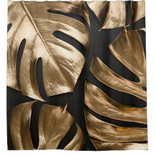 Creative monstera leaves, black background.