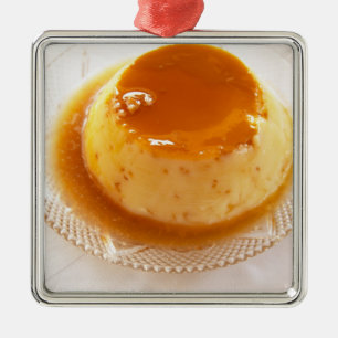 Creme caramel type of pudding with caramel metal ornament