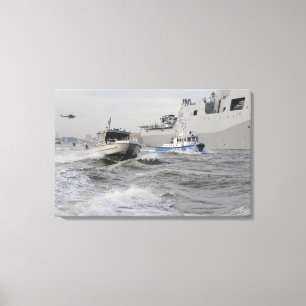Crews from the coast guard and police departmen canvas print