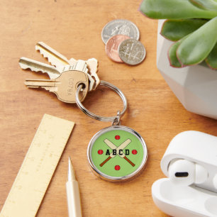 Cricket crossed bats personalized green keychain