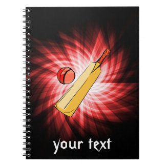 Cricket; red notebook