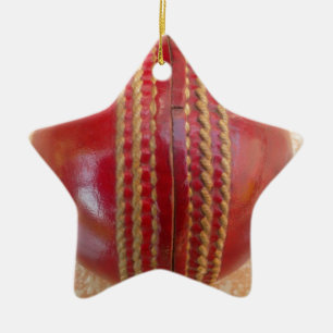 Crimson Stitch Focus: Close-Up of Cricket's Heart Ceramic Ornament