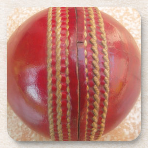 Crimson Stitch Focus: Close-Up of Cricket's Heart Coaster