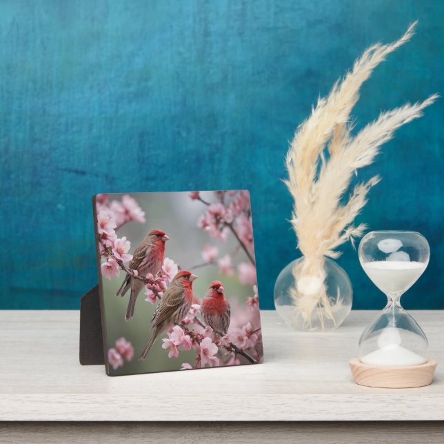 "Crimson Trio: Red Finches Amidst Pink Blooms" Plaque (Insitu)
