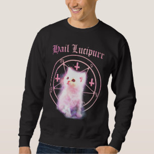 Croix et sweatshirt à l'envers de chaton de