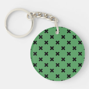 Croix noire sur le vert
