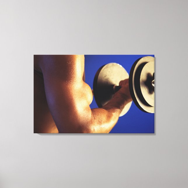 Cropped shot of man lifting weights canvas print (Front)