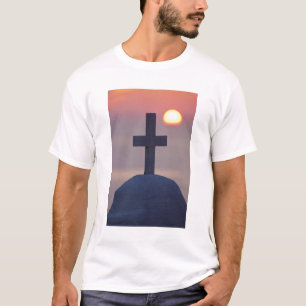 Cross on top of church at sunset, Mykonos,