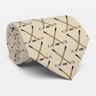 Crossed Hockey Sticks and Puck on beige Tie
