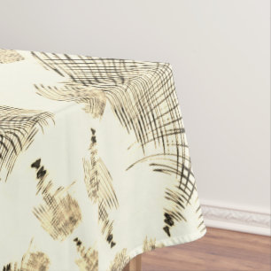 Crossed nut-brown or khaki curved traces up beige tablecloth