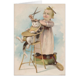 Cru - l'enfant donne à chat une coupe de cheveux,