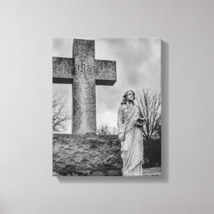 Crucifix and angel in black and white  canvas print