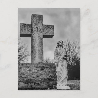 Crucifix and angel in black and white holiday postcard