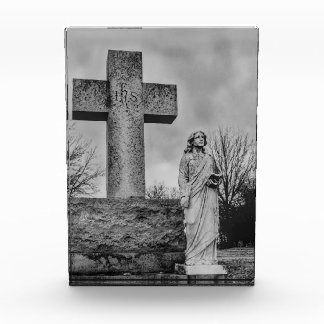 Crucifix and angel in black and white photo block
