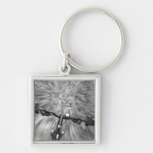 Cruising down a buff section of singletrack keychain