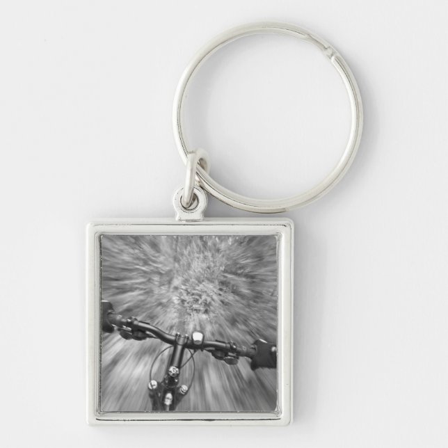 Cruising down a buff section of singletrack keychain (Front)