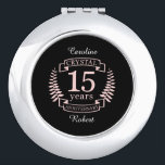 Crystal wedding anniversary 15 years compact mirror<br><div class="desc">A design to celebrate 15 years of marriage. This design has a pink coloured laurel design on a black background. Crystal is the traditional gift for this occasion. The text reads crystal 15 years anniversary. A romantic design to celebrate your 15th year of marriage. If you would like any help...</div>