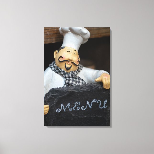 Culinary Delights Await: Chef with Menu Canvas Print (Front)