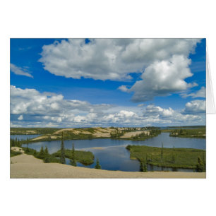 Cumulus clouds float above lakes, Northwest