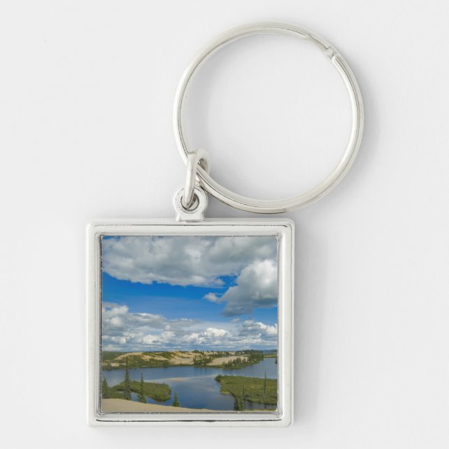 Cumulus clouds float above lakes, Northwest Keychain (Front)