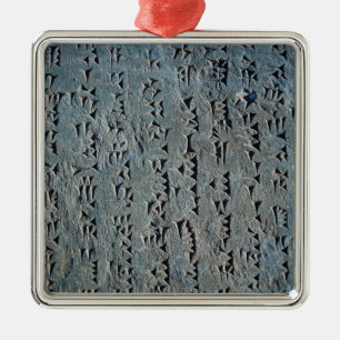 Cuneiform script metal ornament