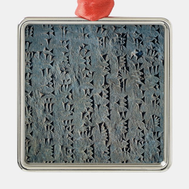 Cuneiform script metal ornament (Front)