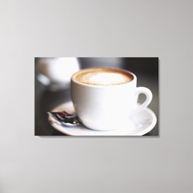 cup of coffee latte on table, close-up canvas print (Front)