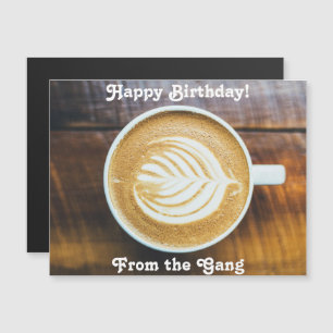 Cup of Coffee Latte with Leaf-Shape Foam on Wood