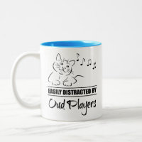 Curious Cat Easily Distracted by Oud Players
