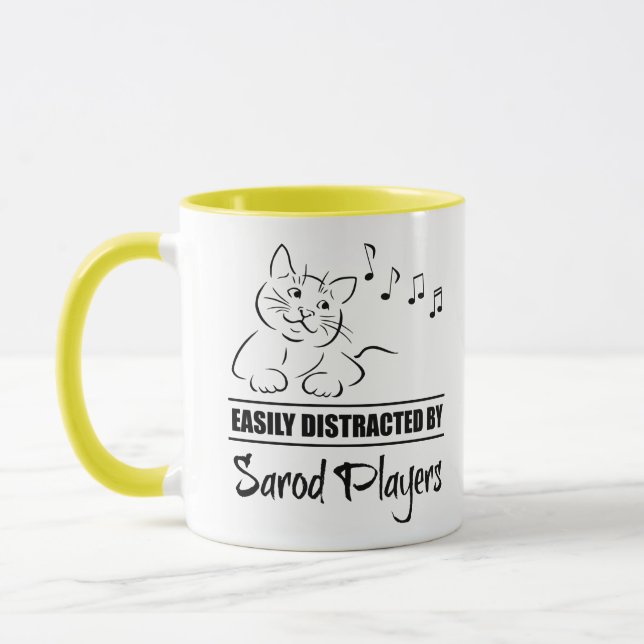 Curious Cat Easily Distracted by Sarod Players Mug (Left)