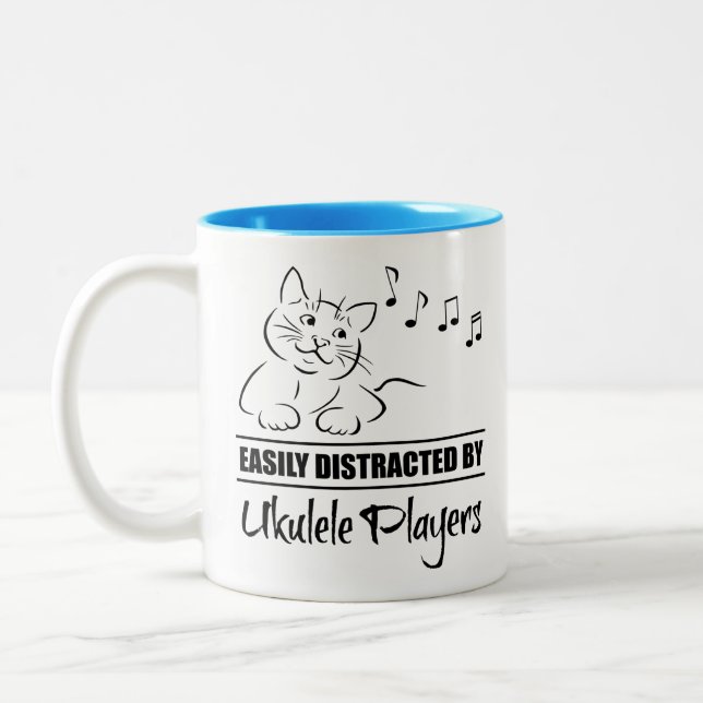 Curious Cat Easily Distracted by Ukulele Players Two-Tone Coffee Mug (Left)