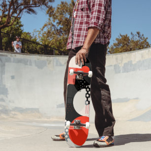 Curving shapes in red, grey and black skateboard